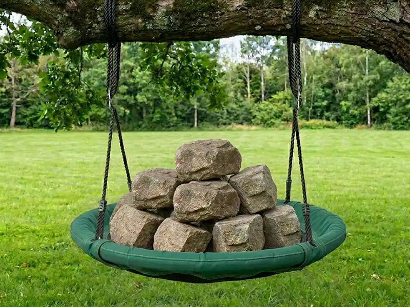 A heavy duty saucer swing